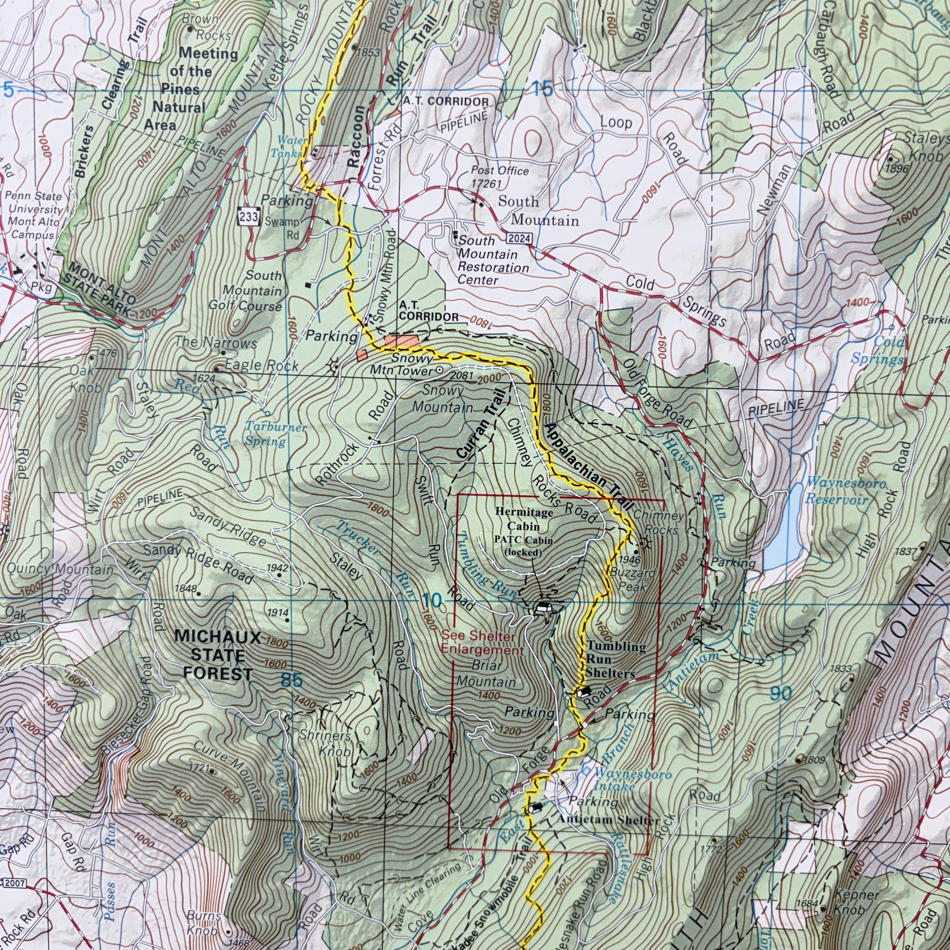 Topographic map of a forested area with hiking trails and landmarks